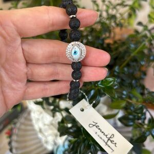 Black Beaded Bracelet with Silver and Blue Eye Charm